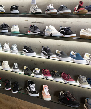 Barcelona, Spain - October 07, 2019: Shelves with sport shoes in the shoes shop. High quality photo
