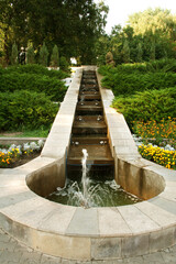 Small round fountain in the park