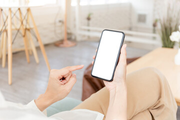 cell phone blank white screen mockup.woman hand holding texting using mobile on desk at office.background empty space for advertise.work people contact marketing business,technology