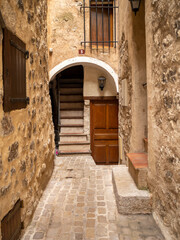 Fototapeta na wymiar traditional stone houses with arch in small provencal village in the French Riviera back country