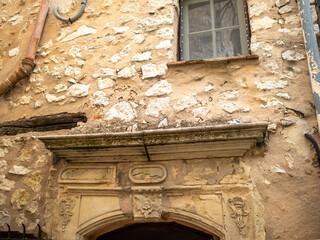 architectural detail on classic ancient door in small provencal village in the French Riviera back country