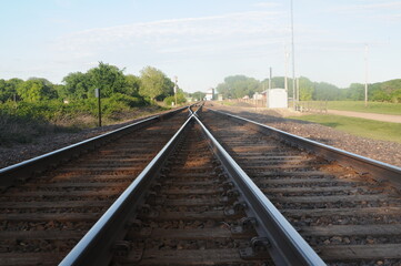 Fototapeta na wymiar very long straight railroad tracks 
