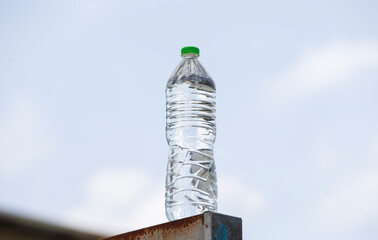 bottle of water on a blue background