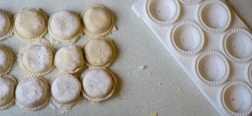 kneading homemade dough. ham and cheese 