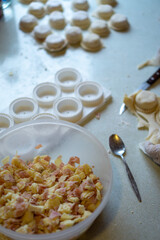 kneading homemade dough. ham and cheese 