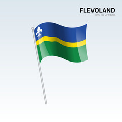 Waving flag of Flevoland provinces of Netherlands isolated on gray background