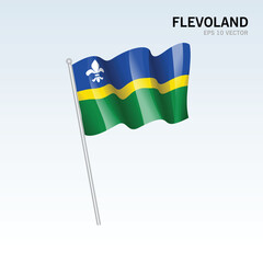Waving flag of Flevoland provinces of Netherlands isolated on gray background