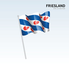 Waving flag of Friesland provinces of Netherlands isolated on gray background