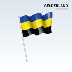 Waving flag of Gelderland provinces of Netherlands isolated on gray background