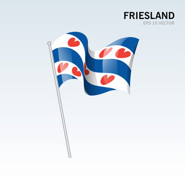 Waving flag of Friesland provinces of Netherlands isolated on gray background