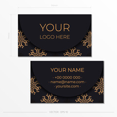 Black business card template with Indian patterns. Print-ready business card design with monogram ornament.