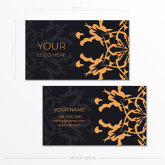 Preparing a business card in Black with Indian patterns. Template for print design business card with monogram ornament.