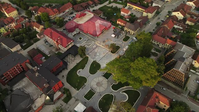 Drone Aerial View of Downtown Bajina Basta, Serbia, Central Square and Buildings on Sunny Evening