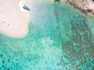 Aerial view, Summer colorful seascape, amazing tropical curve beach. Beautiful paradise in sandy seaside. Peaceful andaman sea at Koh Lipe, Satun, Thailand.