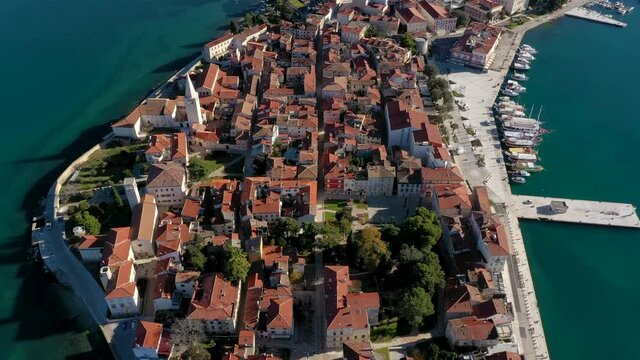 Bird's Eye View Of Euphrasian Basilica In Porec Town And Municipality With Boats On Marina In Croatia. - aerial