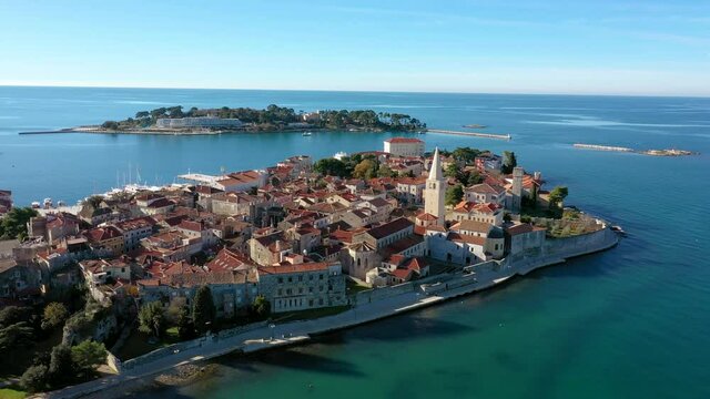 Beautiful Town Of Porec With Euphrasian Basilica Offering Scenic View Of Adriatic Sea In Croatia. - aerial