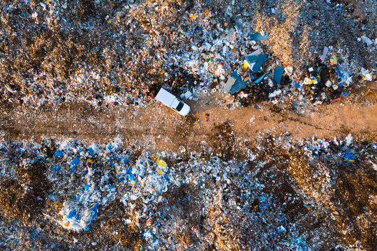 Aerial top view, large garbage pile at sorting site. Garbage pile in trash dump. Environmental pollution from consumerism household.