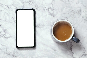 Fototapeta na wymiar Top view Hot coffee and blank screen smartphone, Smartphone with blank mock-up screen, business concept.