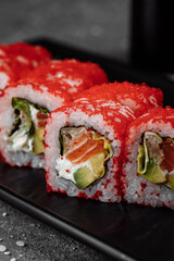Sushi california roll with tuna in caviar