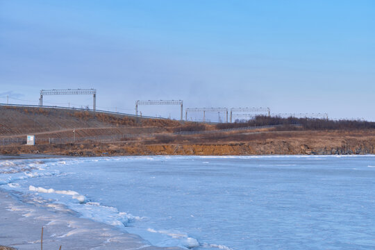 Vanino, Russia - Jan 18, 2021: Vanino Bay in the Tatar Strait in winter. The frozen sea.