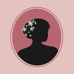 silhouette of a woman with flowers in head on pink background 