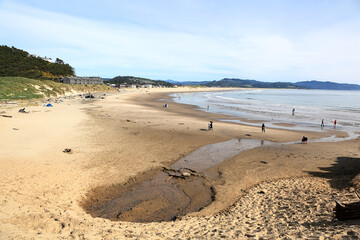 Along The Oregon Coast: Looking down from Cape Kiwanda to the beach at Pacific City.	