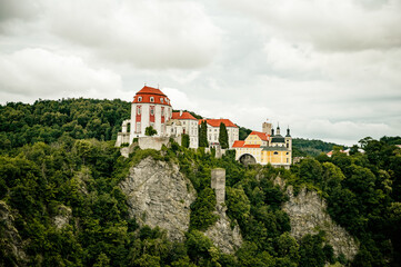 Fototapeta na wymiar Vranov nad Dyji baroque castle in Moravian region in Czech republic. Chateau built in baroque style, placed on big rock above river.