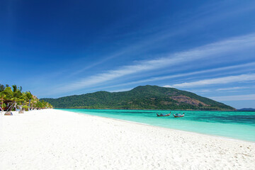 Beautiful Thailand travel island Koh Lipe white sand beach with sea water and clear blue sky landscape background