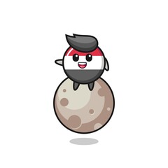 illustration of yemen flag badge cartoon sitting on the moon