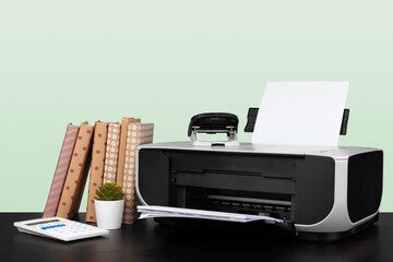 Fototapeta premium Compact home laser printer against gray background