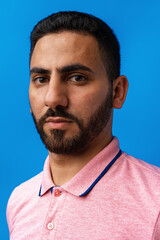 Close up portrait of young arab man in studio