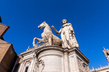 Fototapeta na wymiar Statue of Pollux with his horse at Piazza del Campidoglio, the capitoline hill of Rome,