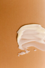 Cosmetic cream texture on neutral background