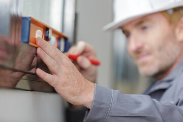 Obraz premium builder posing on construction site