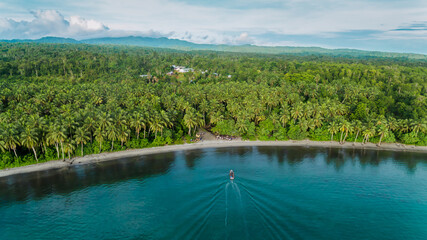 Morning outboard boat beach arrival in North-east Choiseul.
