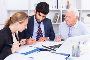 Fototapeta premium Managers are writing financial reports in the office.
