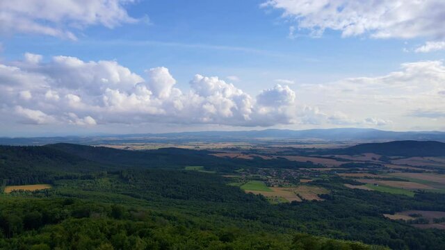 Drone flight over mountain village with forests. Sleza mountain near Wroclaw in Poland. Nature background, aerial view