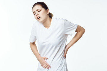 Woman in white t-shirt health problems symptoms disease medicine