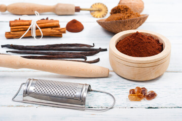 Fototapeta na wymiar dessert ingredients and kitchen utensils on old white wooden table