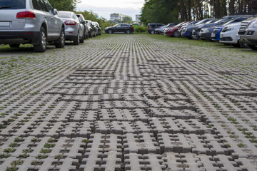 Obraz premium Broken coating in the parking lot. Not high-quality work of builders. Unprofessional approach to work