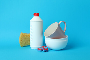 Concept of Dishwashing detergent accessories on blue background