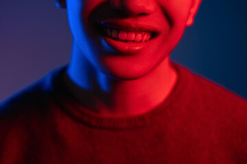 neon light smile positive emotion man face red