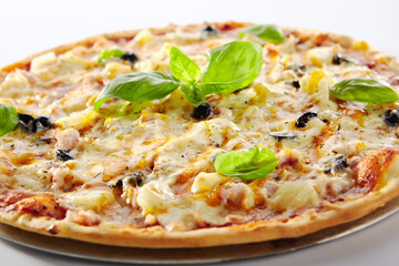 Thin Hawaiian Pizza with Chicken Fillet and Pineapples Isolated