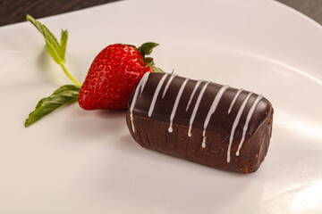 Sweet chocolate cake served strawberry