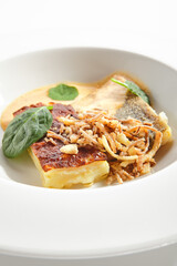 Baked Halibut, Pollock or Cod Fillet with Parsnip Cream Isolated