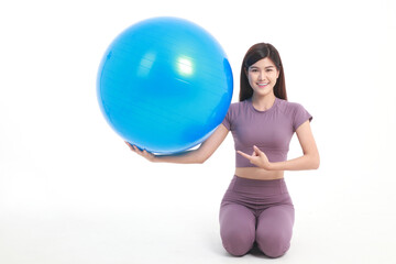 Healthy beautiful Asian woman Put on exercise clothes, play yoga ball. on a white background. weight loss exercise concept