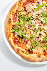 Pizza with Tuna, Olives and Arugula Top View Isolated