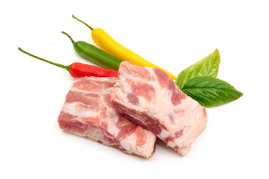 Raw pork ribs, isolated on white background. High resolution image.