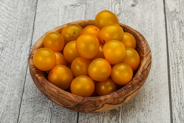 Fresh yellow cherry tomato heap
