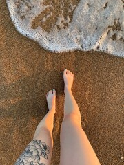 feet on the beach